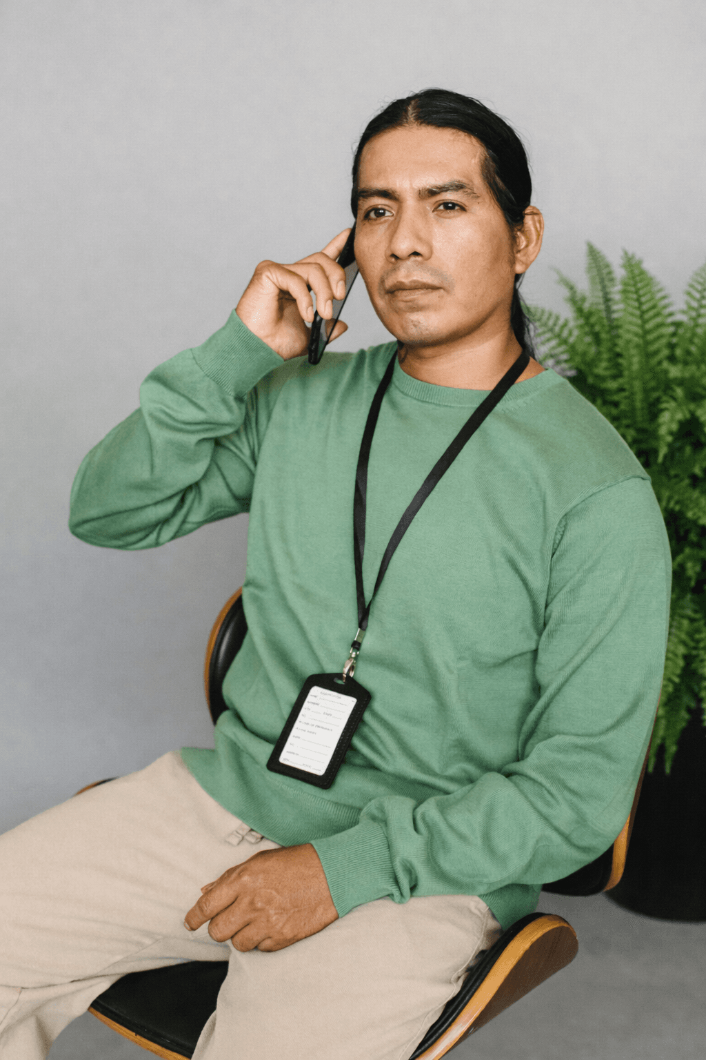 Attendee with name badge on a call